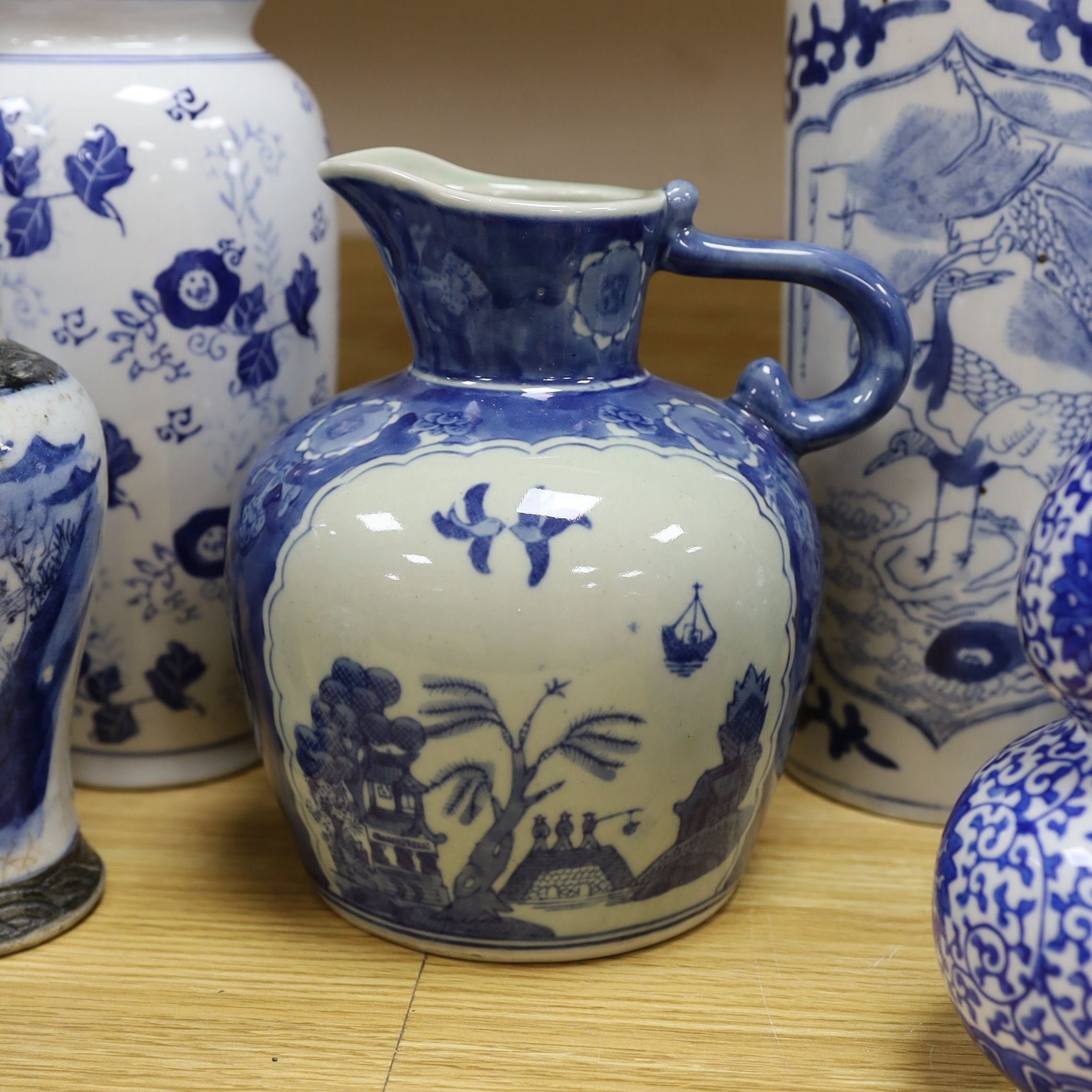 A group of Chinese blue and white porcelain including an early 20th century vase, tallest 28cm